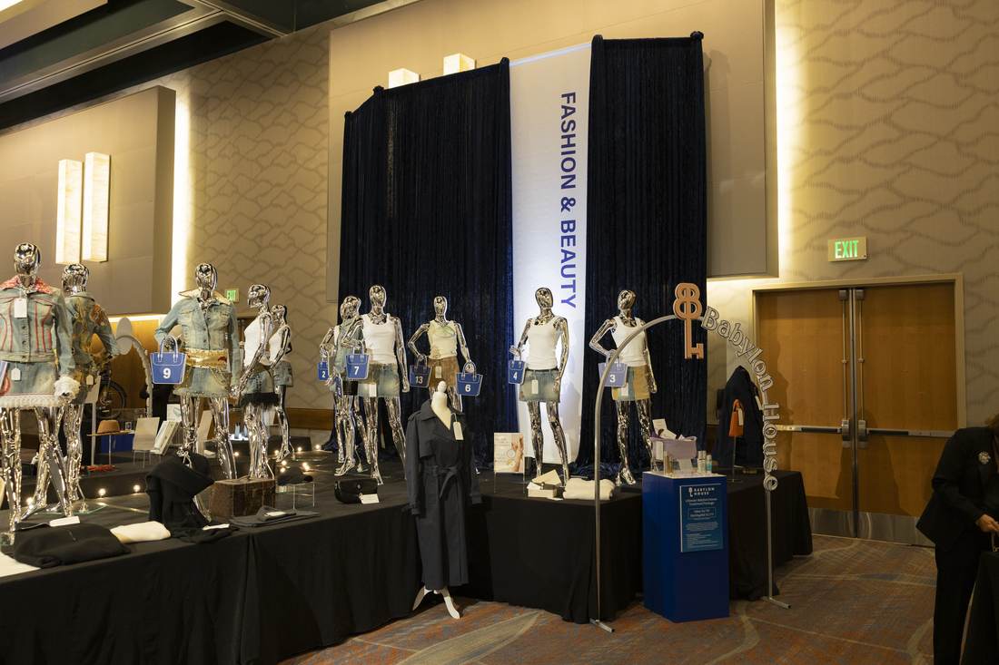 Mannequins with Babylon House arch signage