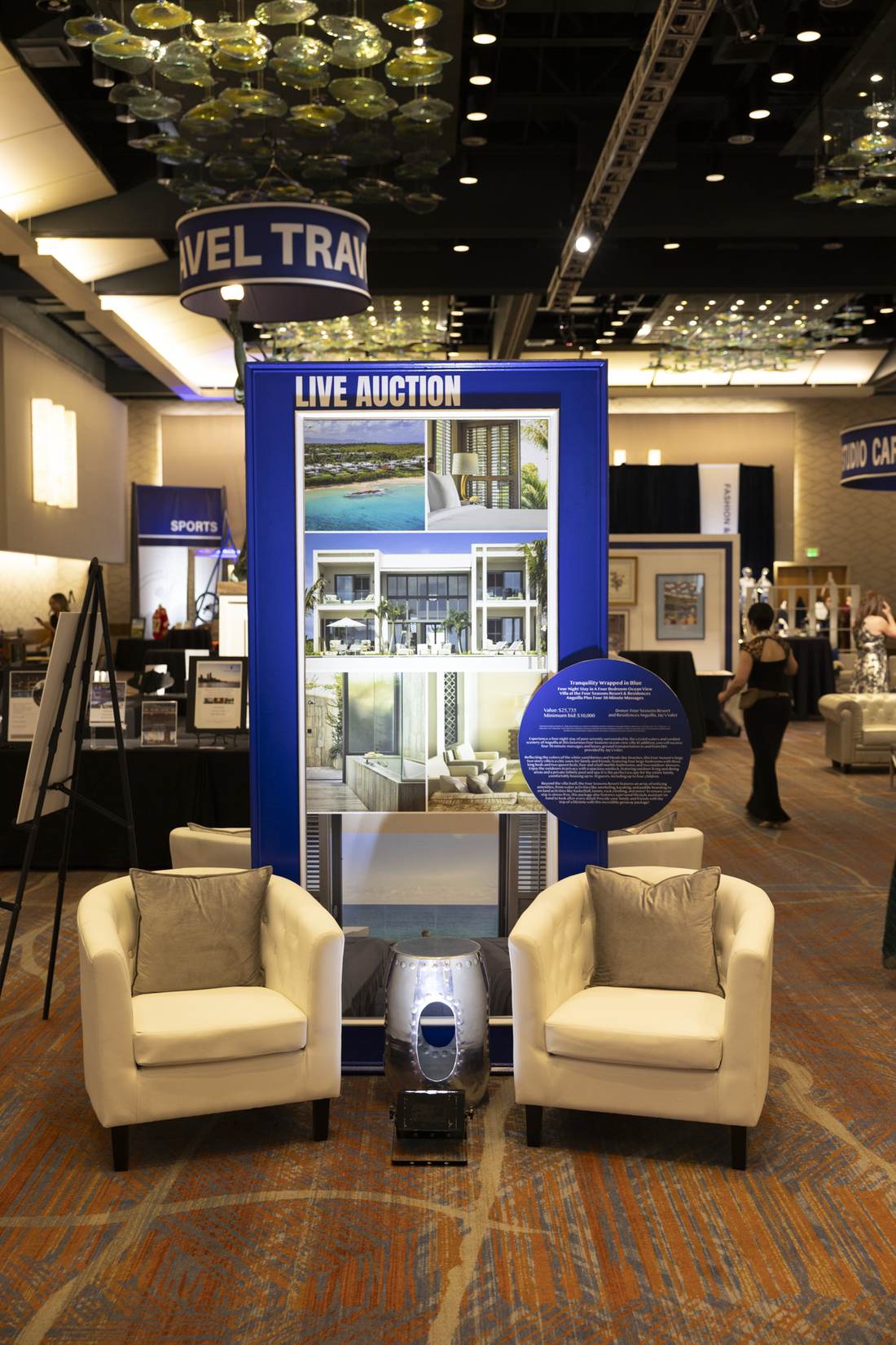 Live auction display for a Four Seasons Anguilla travel package