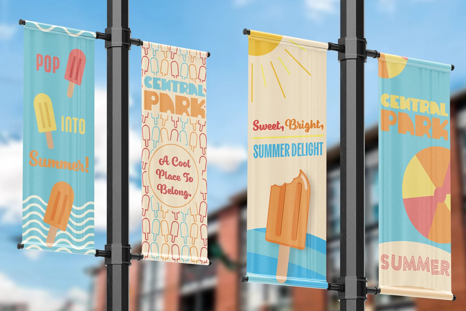 Mockups of four Central Park pole banner designs on light poles
