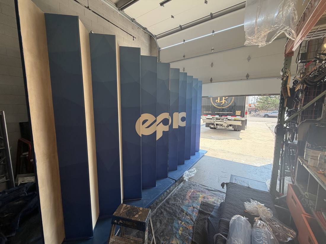 Full-size panels mid-build in the fabrication shop