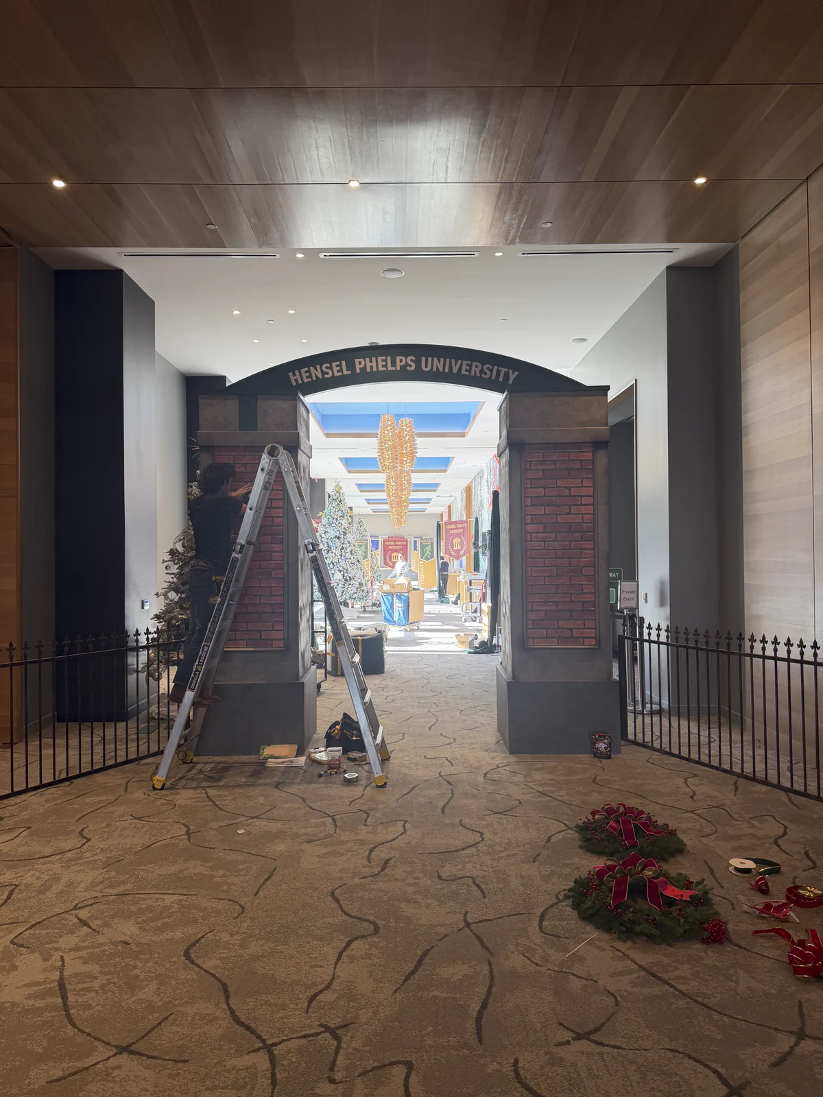The archway mid-install with ladders before decoration