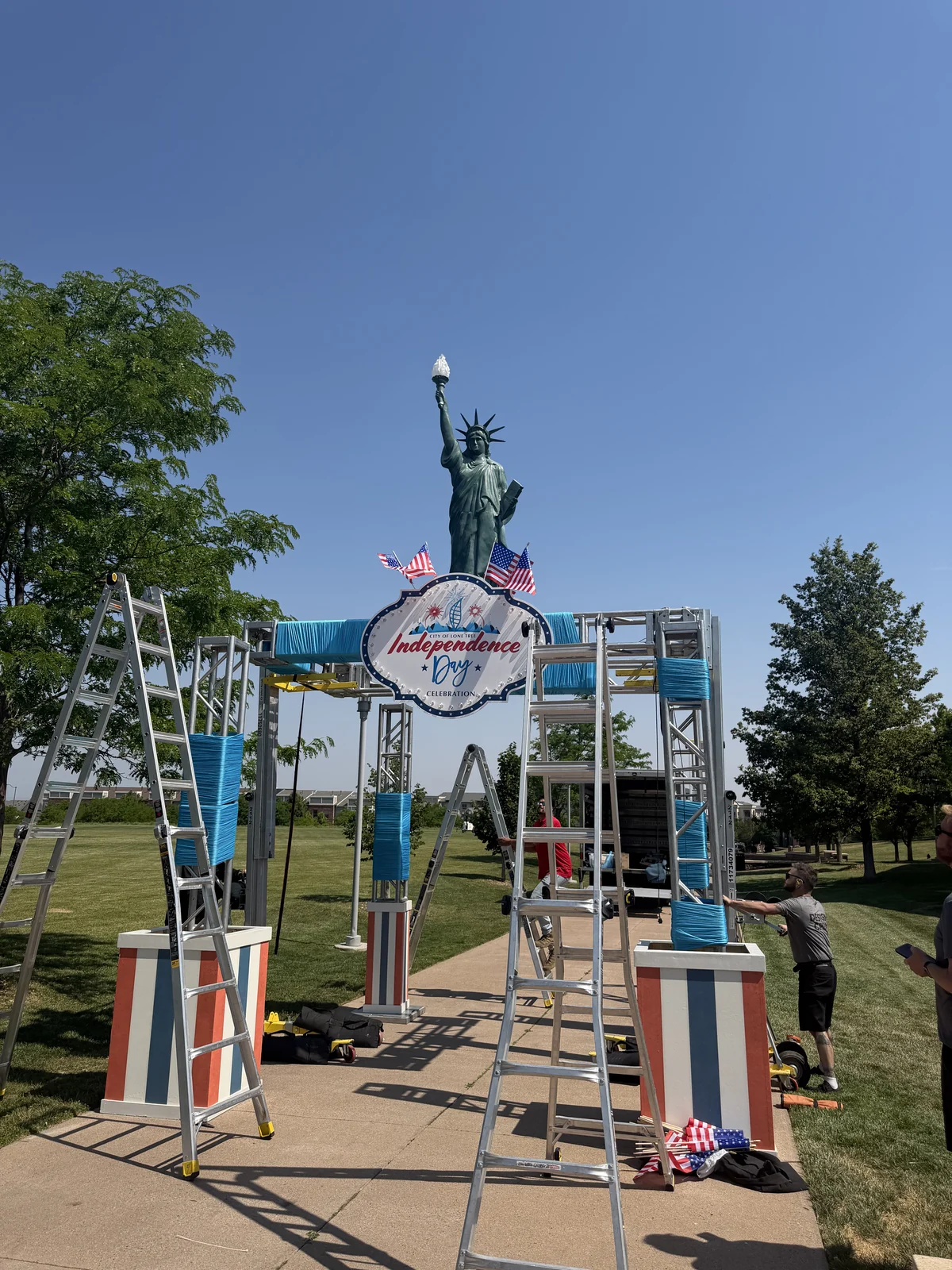 The Independence Day arch going up